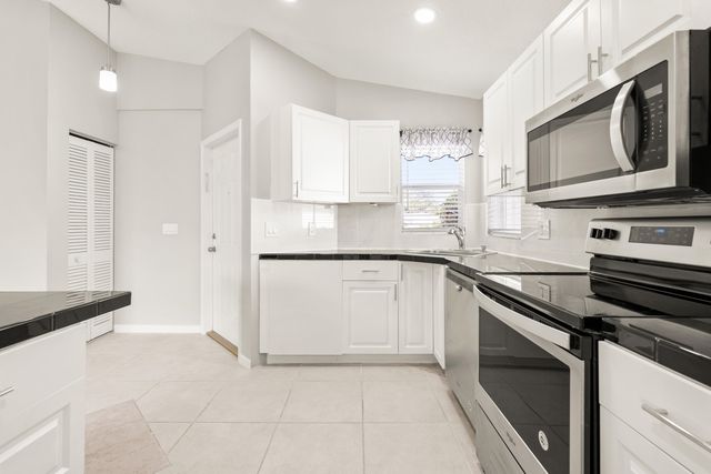 1209 PINE SAGE Circle, West Palm Beach, FL 33409