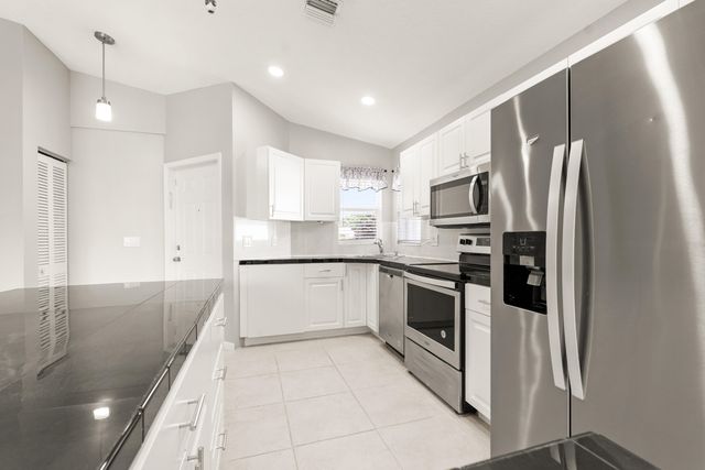 1209 PINE SAGE Circle, West Palm Beach, FL 33409