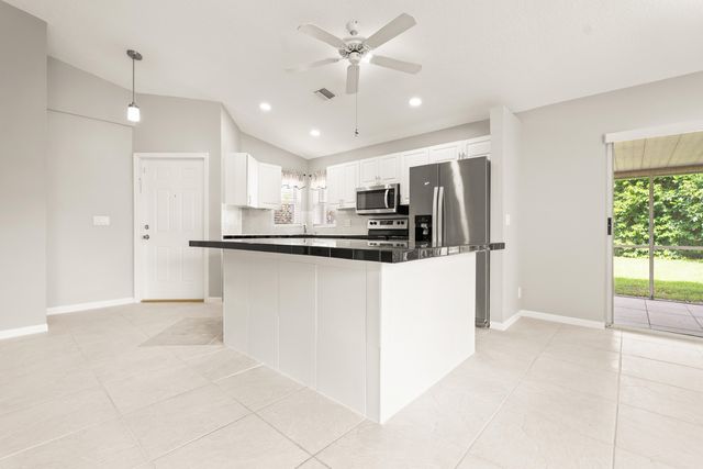 1209 PINE SAGE Circle, West Palm Beach, FL 33409