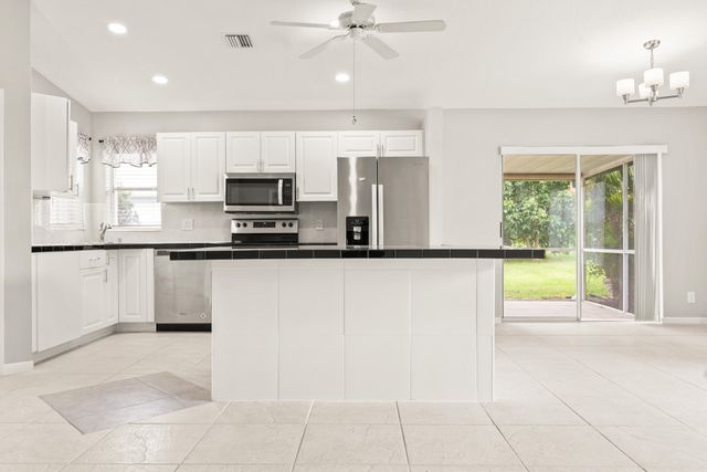 1209 PINE SAGE Circle, West Palm Beach, FL 33409