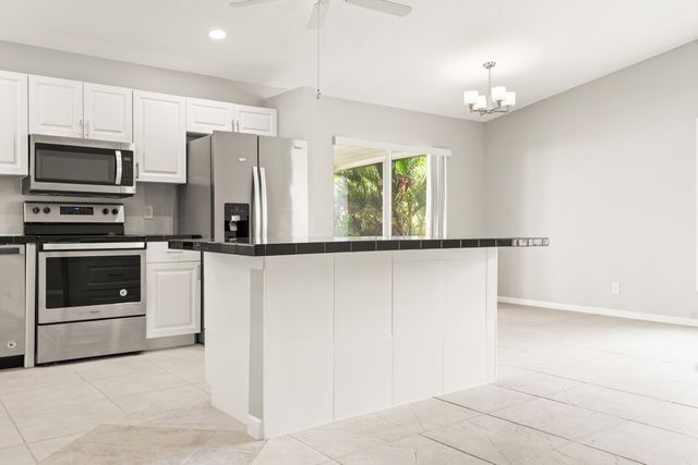 1209 PINE SAGE Circle, West Palm Beach, FL 33409