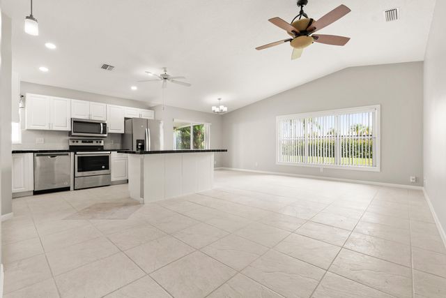 1209 PINE SAGE Circle, West Palm Beach, FL 33409