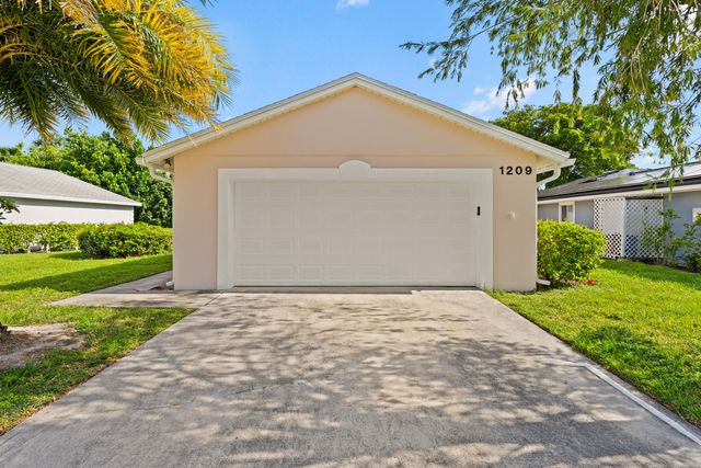 1209 PINE SAGE Circle, West Palm Beach, FL 33409