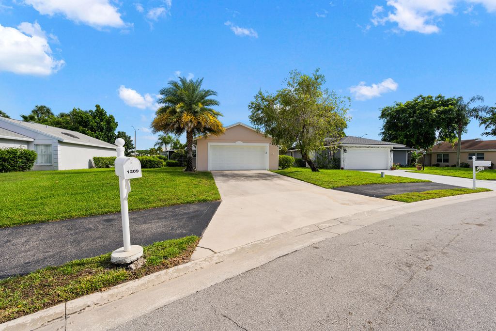 1209 PINE SAGE Circle, West Palm Beach, FL 33409