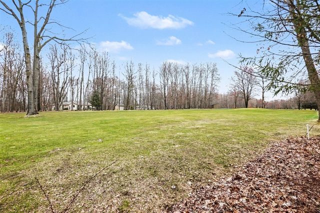 9362 Clubhouse Drive, Canadian Lakes, MI 49346