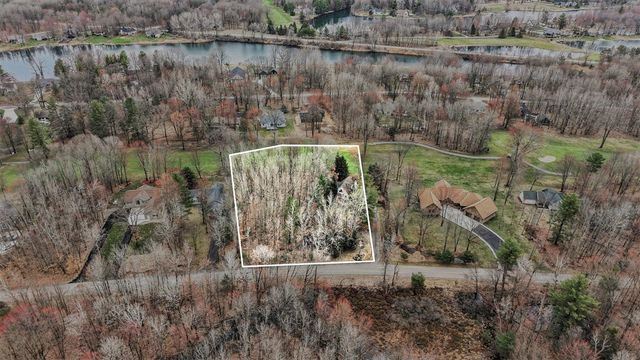 9362 Clubhouse Drive, Canadian Lakes, MI 49346