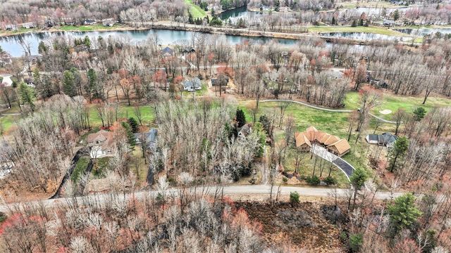 9362 Clubhouse Drive, Canadian Lakes, MI 49346