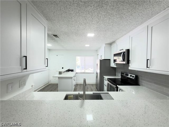3451 County Barn RD G203, Naples, FL 34112