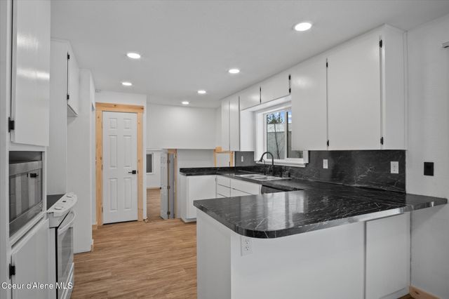 6933 W Tesemini DR, Spirit Lake, ID 83869