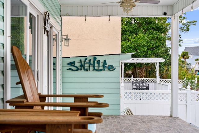 7018 S Lagoon Drive, Panama City Beach, FL 32408