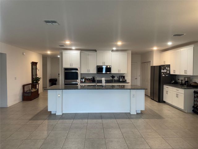 6615 RHYTHM DRIVE, Mascotte, FL 34753