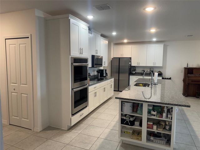 6615 RHYTHM DRIVE, Mascotte, FL 34753