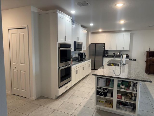 6615 RHYTHM DRIVE, Mascotte, FL 34753
