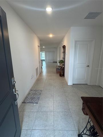 6615 RHYTHM DRIVE, Mascotte, FL 34753