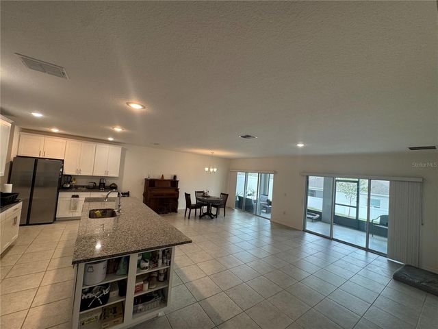 6615 RHYTHM DRIVE, Mascotte, FL 34753
