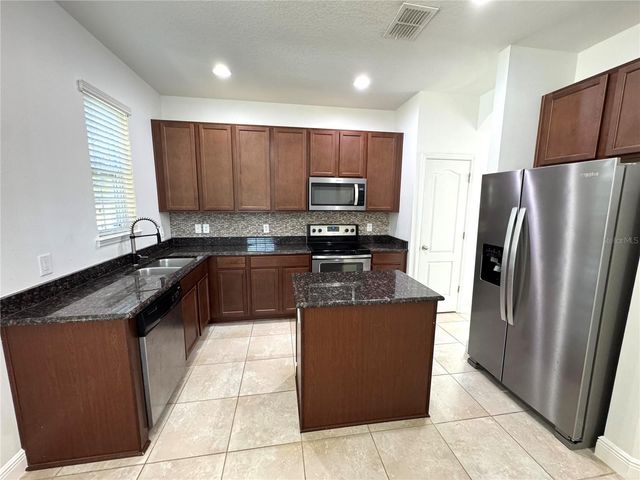 12784 GARRIDAN AVENUE, Windermere, FL 34786