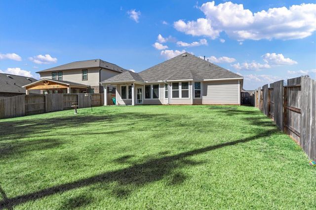713 Ivory Creek Court, Willis, TX 77378