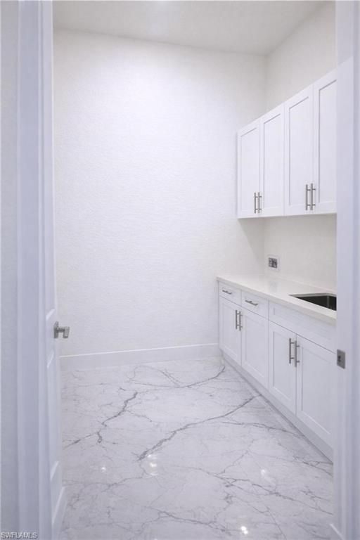 Image 10 of property listing at 2751 NW 42nd PL, Cape Coral, FL 33993
