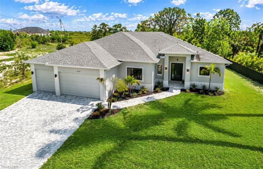 Image 2 of property listing at 2751 NW 42nd PL, Cape Coral, FL 33993