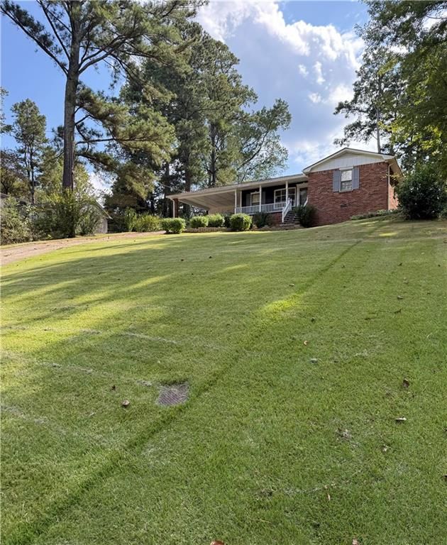 5578 Four Winds SW Drive, Lilburn, GA 30047