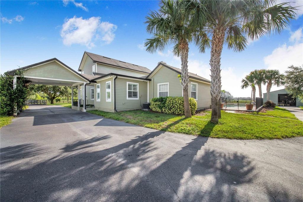 Image 3 of property listing at 6631 LAKE HATCHINEHA ROAD, Haines City, FL 33844