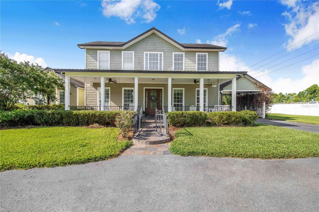 Image 4 of property listing at 6631 LAKE HATCHINEHA ROAD, Haines City, FL 33844