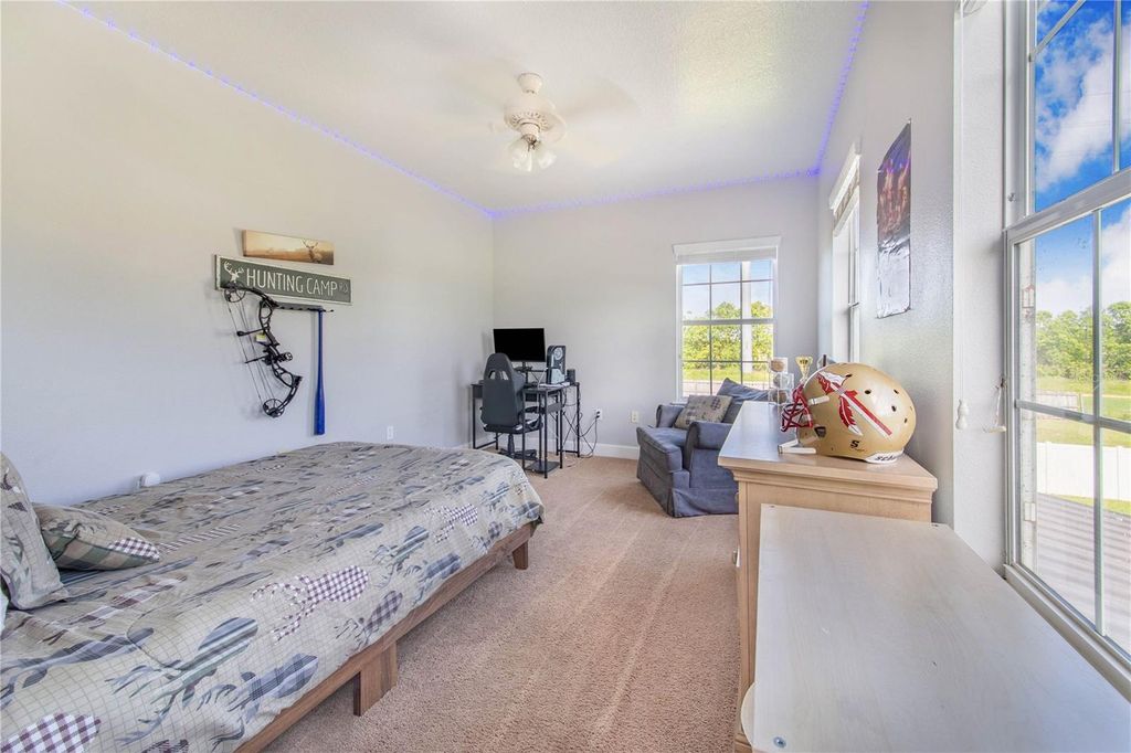 Image 40 of property listing at 6631 LAKE HATCHINEHA ROAD, Haines City, FL 33844