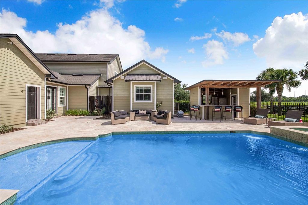 Image 50 of property listing at 6631 LAKE HATCHINEHA ROAD, Haines City, FL 33844