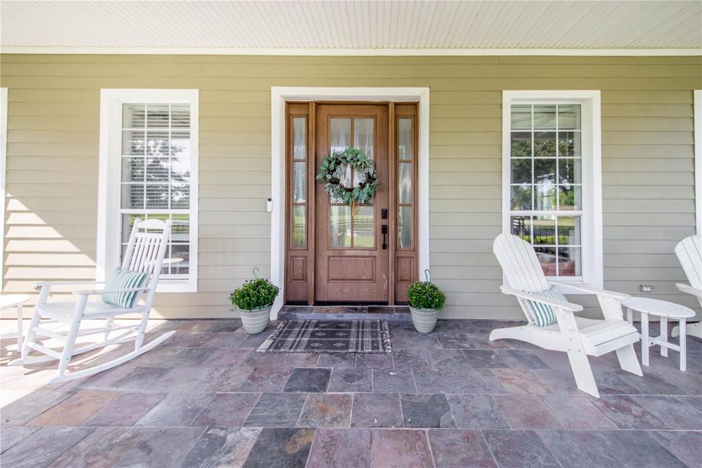 Image 6 of property listing at 6631 LAKE HATCHINEHA ROAD, Haines City, FL 33844