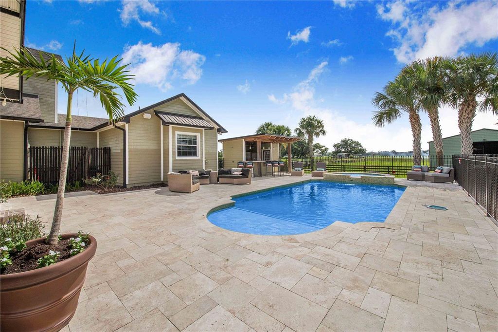 Image 52 of property listing at 6631 LAKE HATCHINEHA ROAD, Haines City, FL 33844