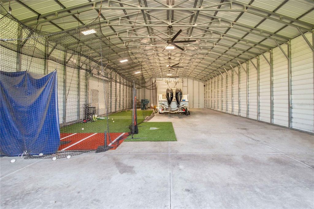 Image 57 of property listing at 6631 LAKE HATCHINEHA ROAD, Haines City, FL 33844