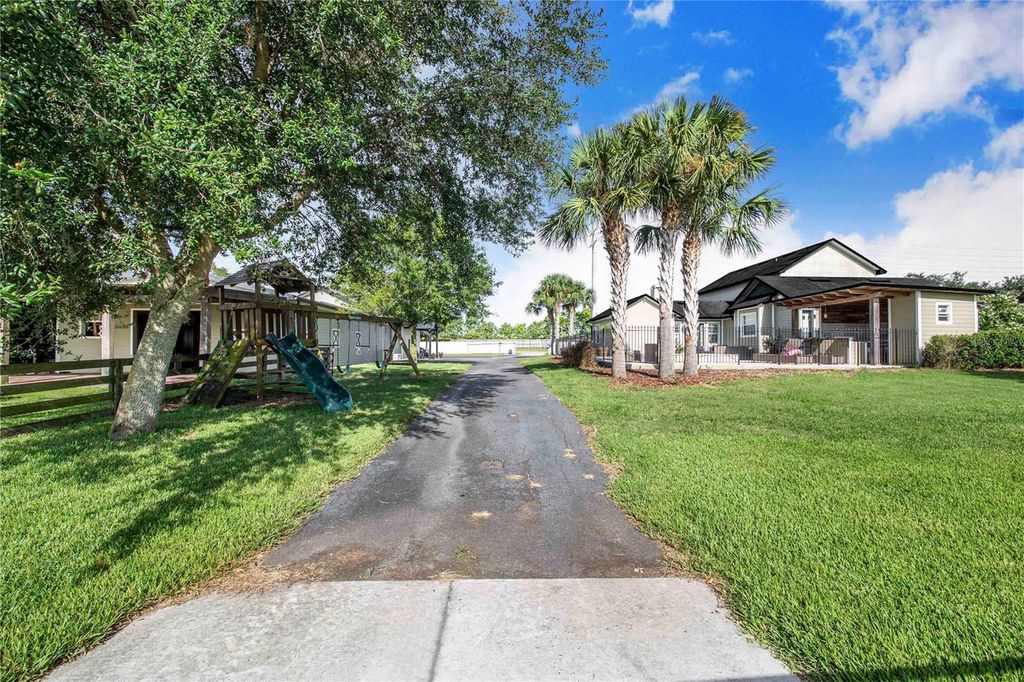 Image 58 of property listing at 6631 LAKE HATCHINEHA ROAD, Haines City, FL 33844