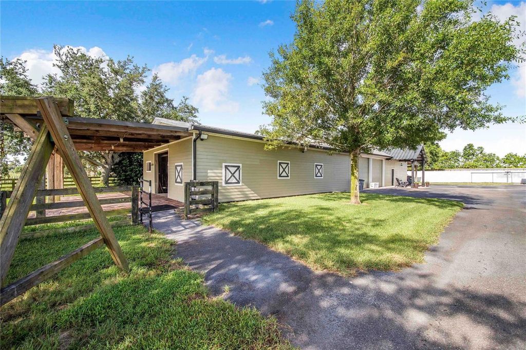 Image 59 of property listing at 6631 LAKE HATCHINEHA ROAD, Haines City, FL 33844