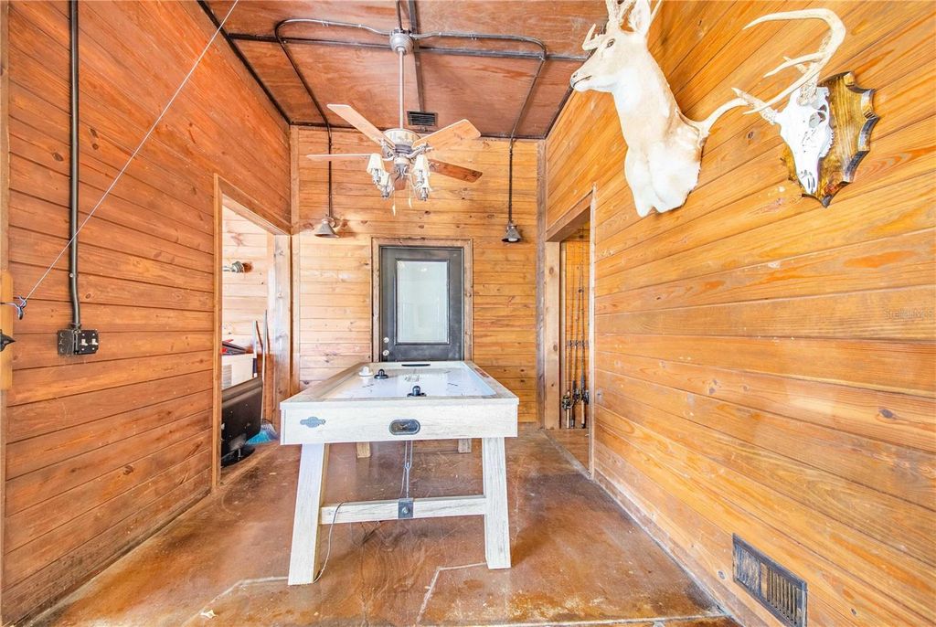 Image 71 of property listing at 6631 LAKE HATCHINEHA ROAD, Haines City, FL 33844