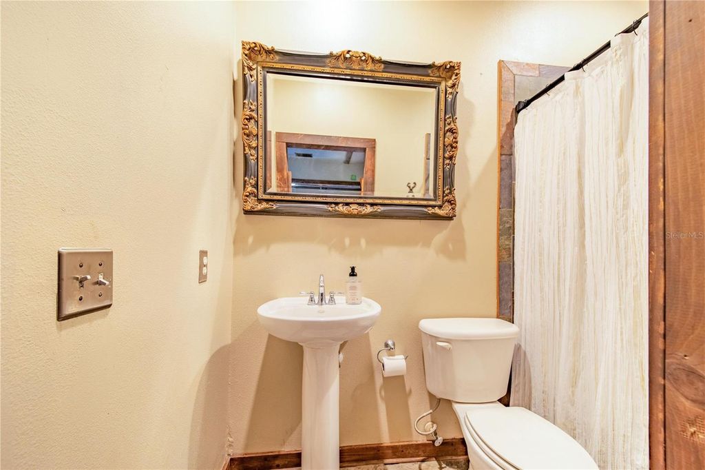 Image 74 of property listing at 6631 LAKE HATCHINEHA ROAD, Haines City, FL 33844