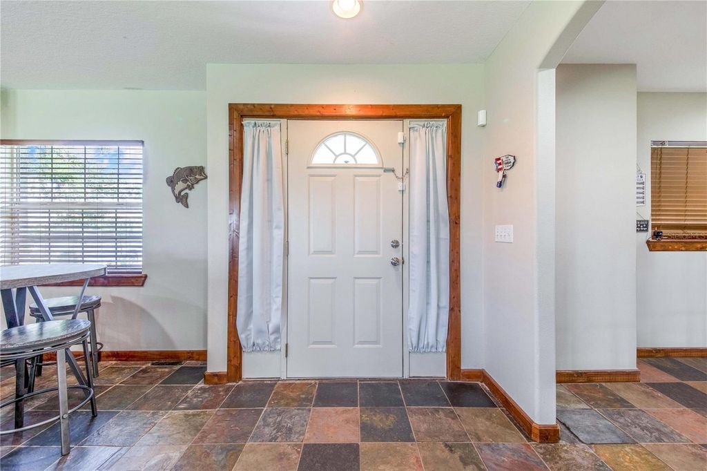 Image 80 of property listing at 6631 LAKE HATCHINEHA ROAD, Haines City, FL 33844