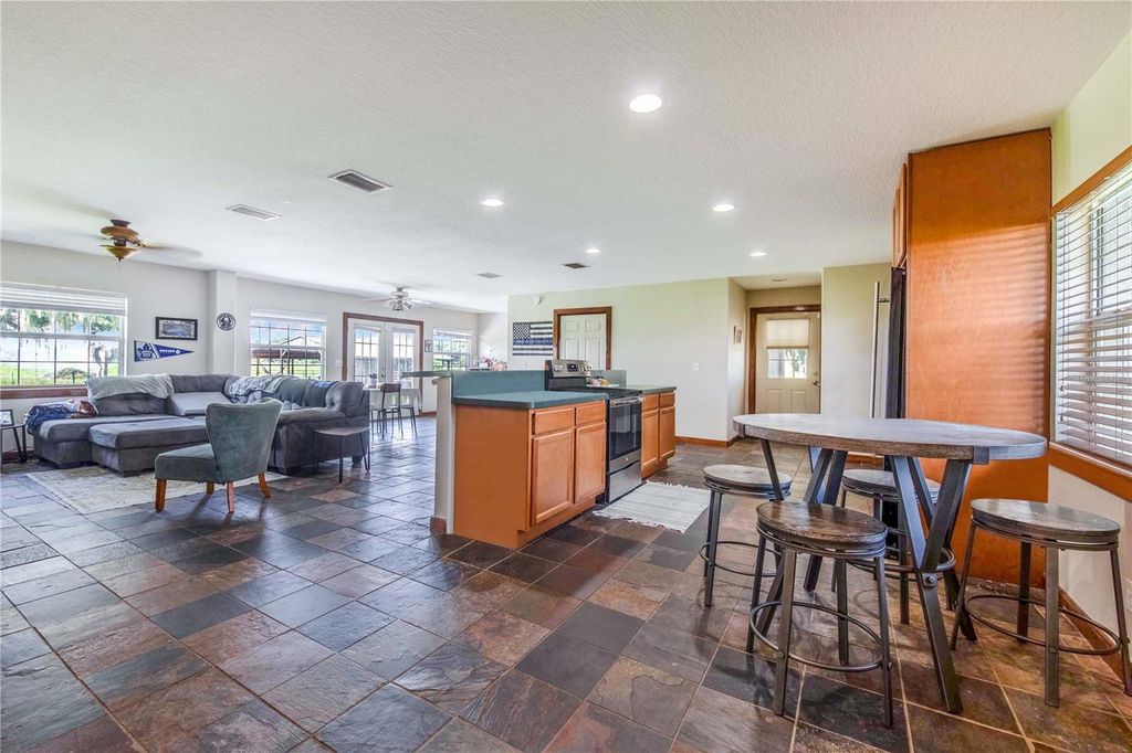 Image 81 of property listing at 6631 LAKE HATCHINEHA ROAD, Haines City, FL 33844