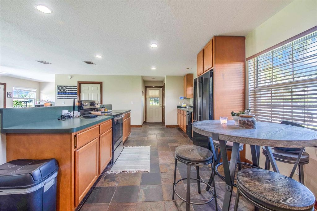 Image 82 of property listing at 6631 LAKE HATCHINEHA ROAD, Haines City, FL 33844