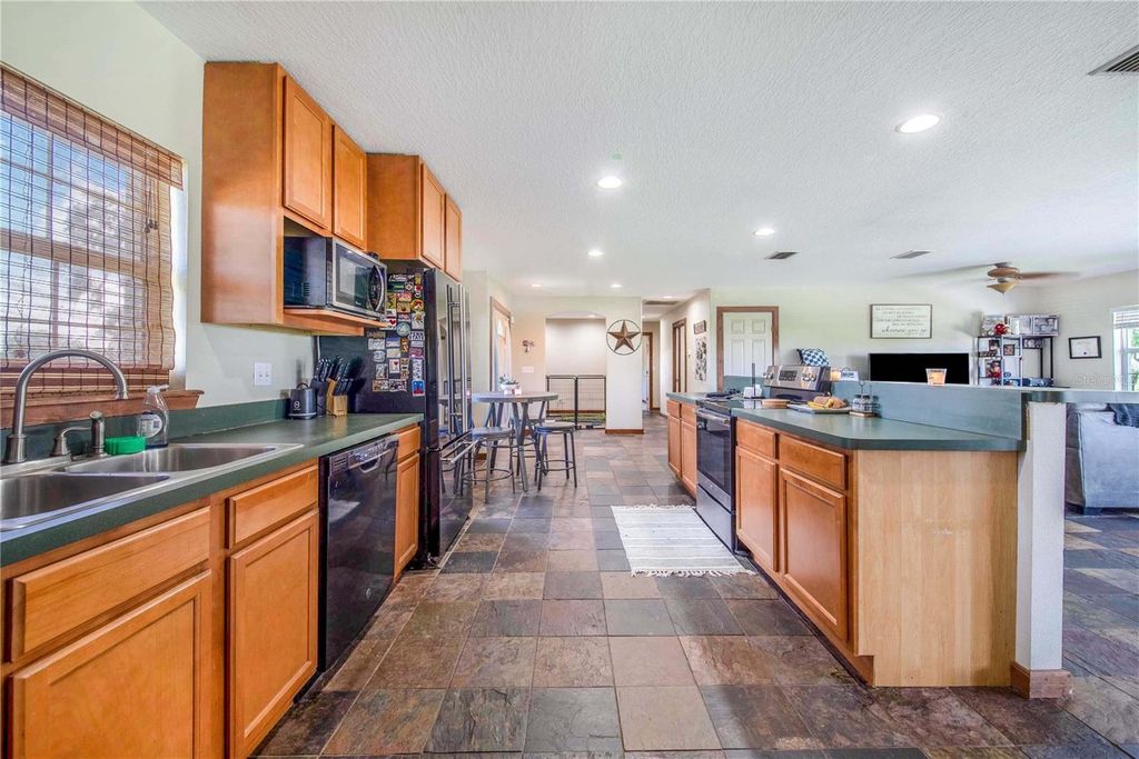 Image 83 of property listing at 6631 LAKE HATCHINEHA ROAD, Haines City, FL 33844