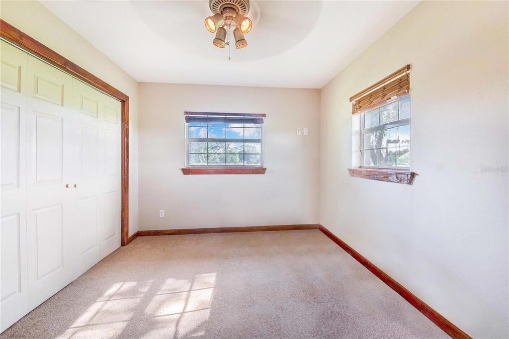 Image 90 of property listing at 6631 LAKE HATCHINEHA ROAD, Haines City, FL 33844