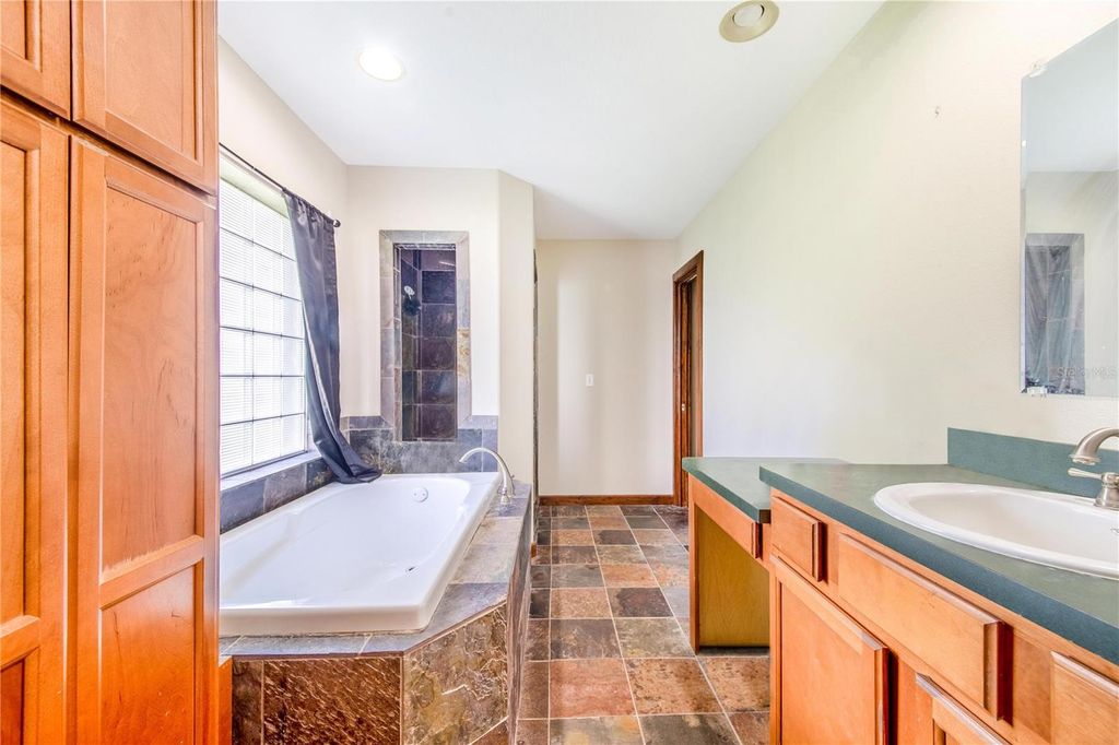 Image 92 of property listing at 6631 LAKE HATCHINEHA ROAD, Haines City, FL 33844