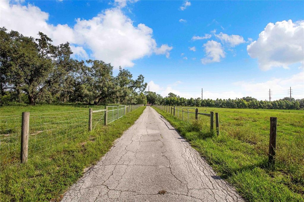Image 97 of property listing at 6631 LAKE HATCHINEHA ROAD, Haines City, FL 33844