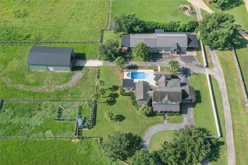 Image 98 of property listing at 6631 LAKE HATCHINEHA ROAD, Haines City, FL 33844