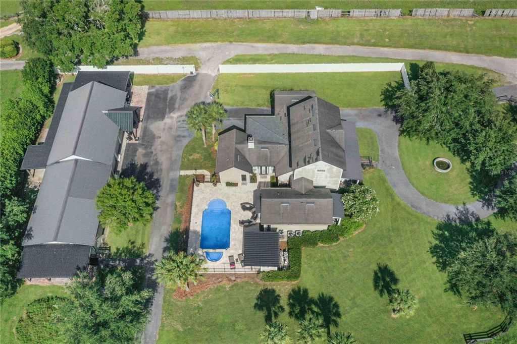 Image 100 of property listing at 6631 LAKE HATCHINEHA ROAD, Haines City, FL 33844