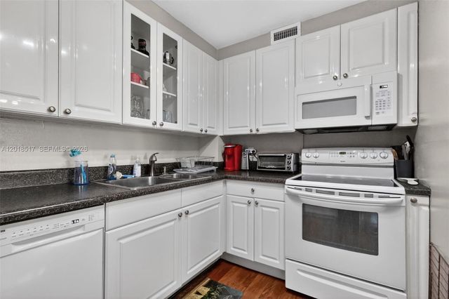 401 Golden Isles Dr 208, Hallandale Beach, FL 33009