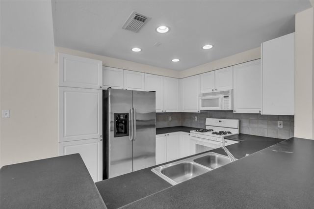 15 Scarlet Woods Court, The Woodlands, TX 77380