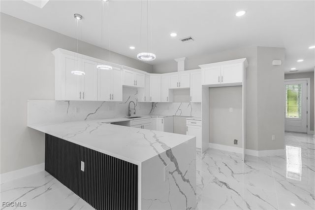 913 E 12th ST, Lehigh Acres, FL 33972