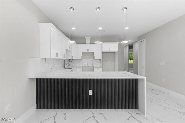 913 E 12th ST, Lehigh Acres, FL 33972