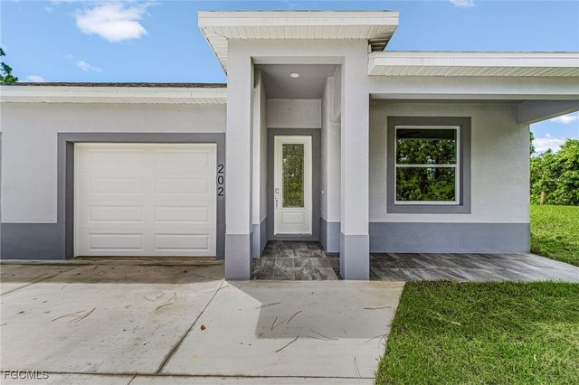 913 E 12th ST, Lehigh Acres, FL 33972