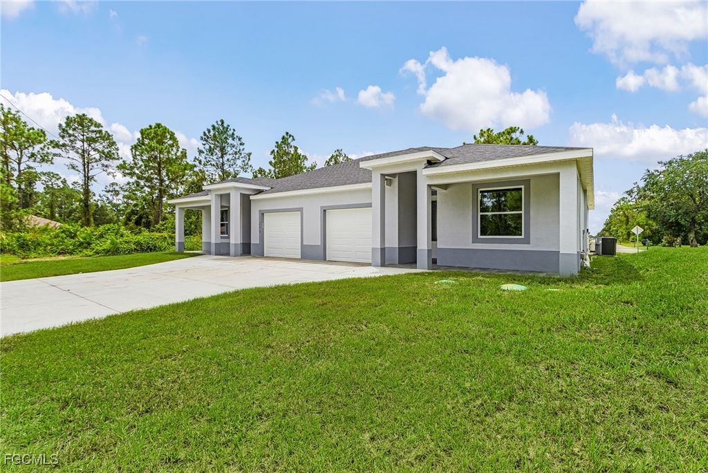 913 E 12th ST, Lehigh Acres, FL 33972